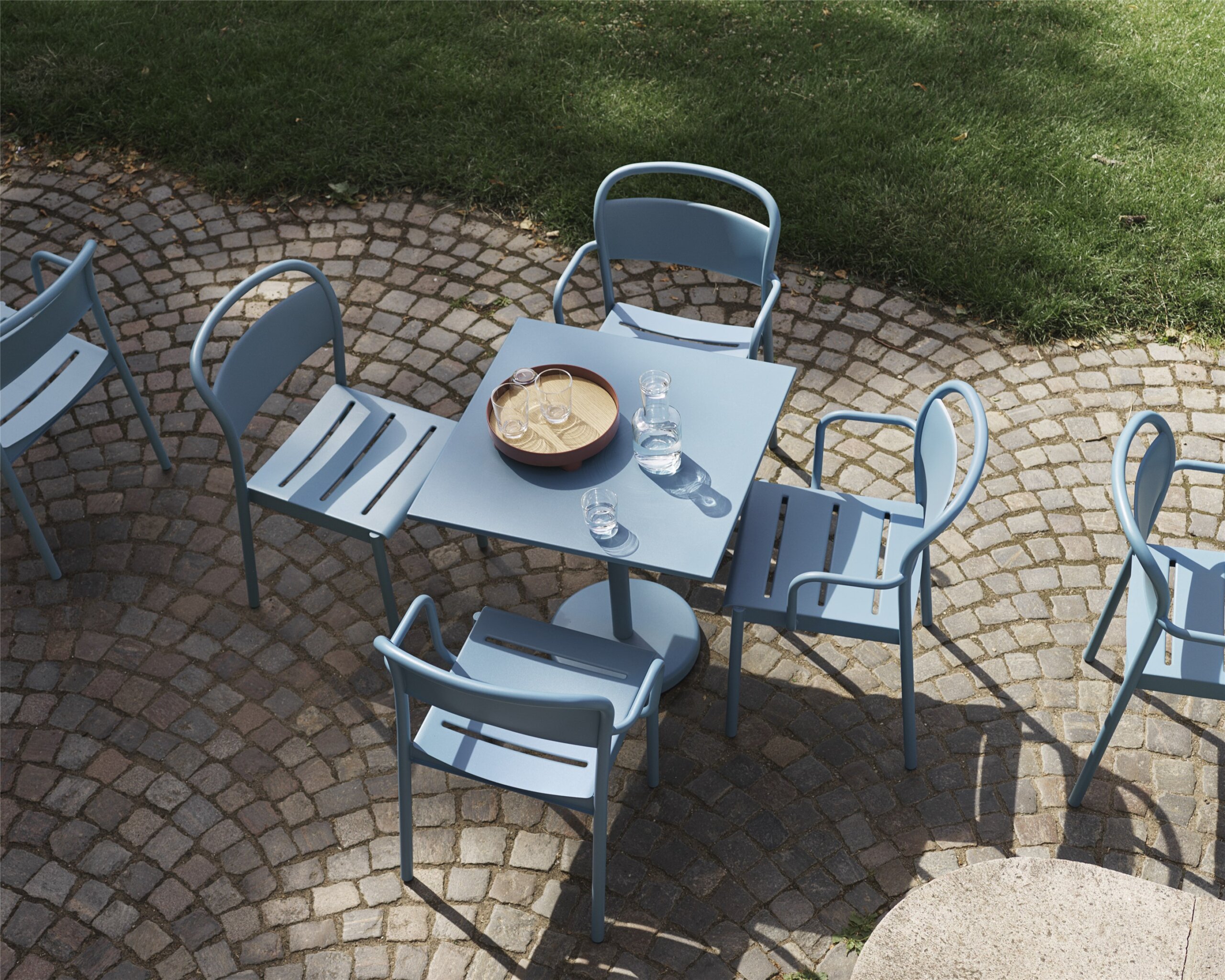 linear-steel-cafe-table-70x70-h73-side-chair-armchair-pale-blue-raise-carafe-glass-platform-tray-muuto-org_150.jpg